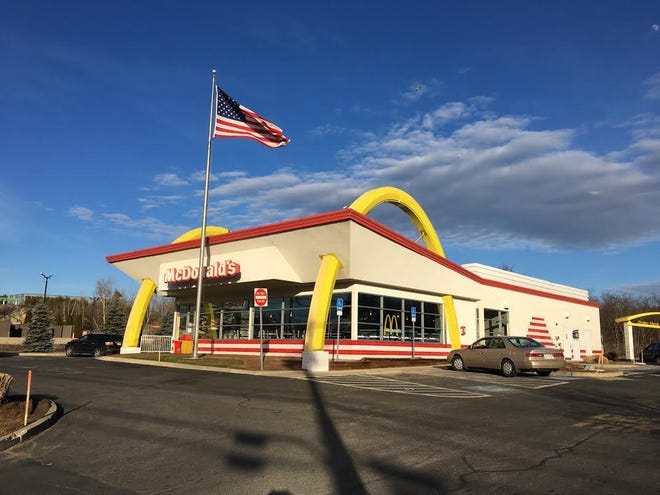 Golden arches curve around and through a McDonalds built in the original style. 

[THE PROVIDENCE JOURNAL/PETER C.T. ELSWORTH]
