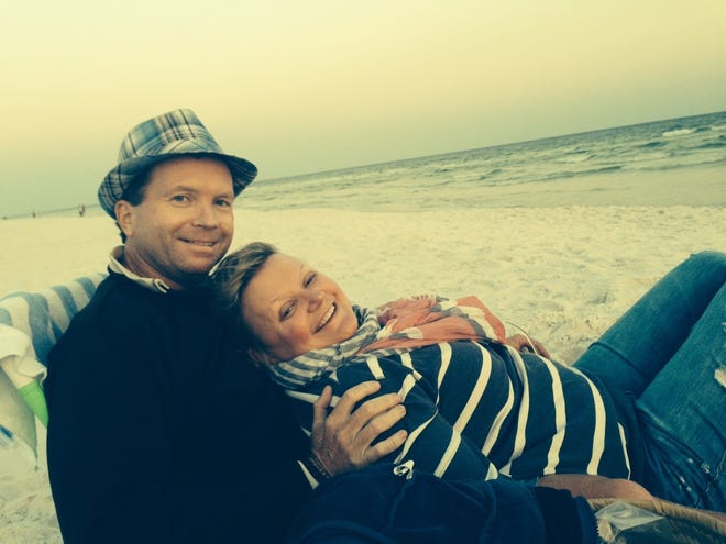 Jeff and Heidi Ellis think there is not better place to celebrate Valentine's Day than on the beach. [SPECIAL TO THE SUN]