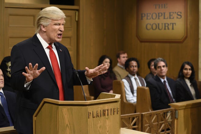 This Feb. 11 image released by NBC shows host Alec Baldwin as President Donald Trump during the "Trump People's Court" in New York. [WILL HEATH / NBC VIA AP]