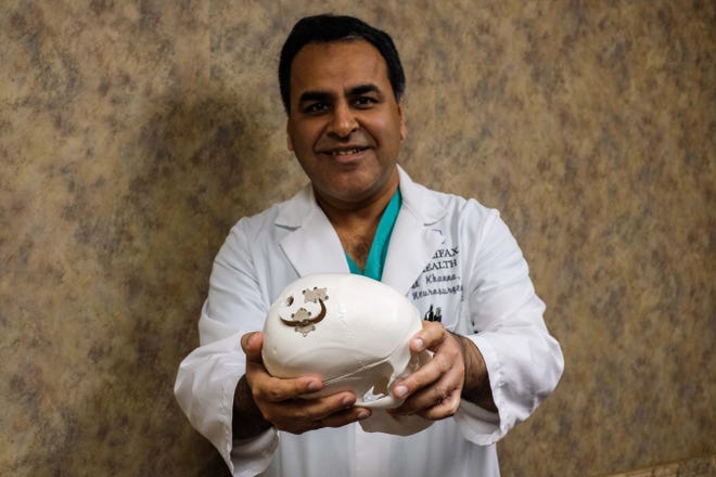 Dr. Rohit Khanna of Halifax Health Medical Center is working to develop an expandable device that could reduce the number of surgeries from traumatic brain injuries and stroke. [News-Journal / LOLA GOMEZ]