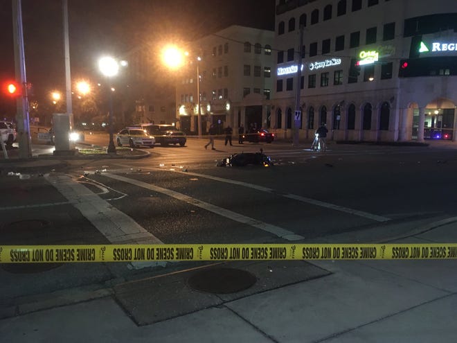 The rider of a moped is in critical condition after colliding with a BMW at around midnight at Ringling Boulevard and Oranage Avenue. [hERALD-TRIBUNE STAFF PHOTO / KAT DOW]