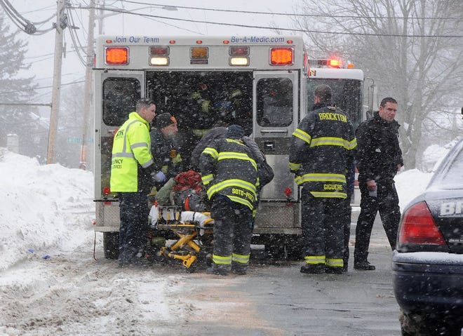 A file photo shows a pedestrian accident on West Elm Street during a snowstorm in February 2015.