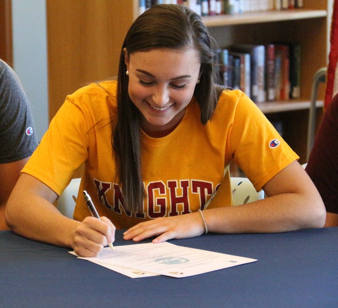 Lakewood's Kennedy Geiger signed with Calvin College on Monday. [Connor Ryan / Ionia Sentinel-Standard]