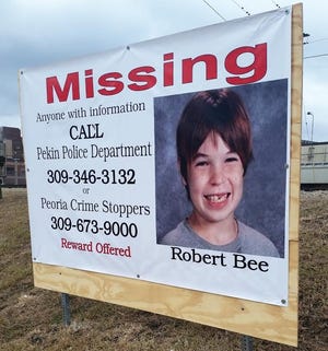MICHAEL SMOTHERS/GATEHOUSE MEDIA ILLINOIS A sign erected by police at Derby and Second streets in Pekin calls on the public to continue its help in the search for Robert Bee, 13, missing since Nov. 17. Two other signs also have been placed in the city by police.