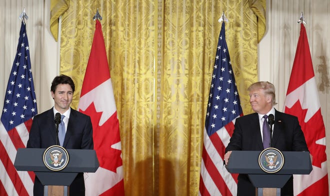 President Donald Trump and Canadian Prime Minister Justin Trudeau participate in a joint news conference in the East Room of the White House in Washington, Monday, Feb. 13, 2017. THE ASSOCIATED PRESS
