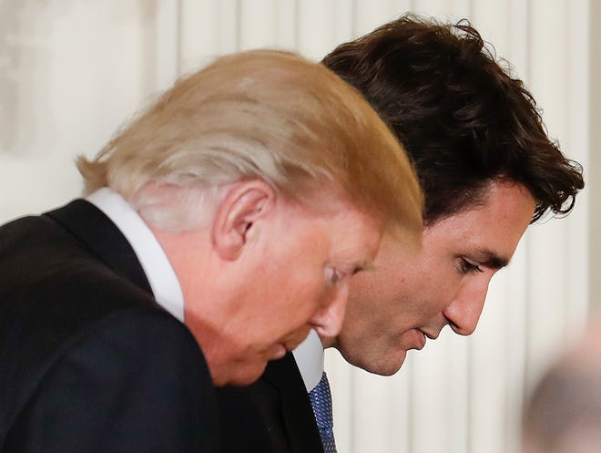President Donald Trump and Canadian Prime Minister Justin Trudeau walks off at the conclusion of a joint news conference in the East Room of the White House in Washington, Monday, Feb. 13, 2017. (AP Photo/Pablo Martinez Monsivais)