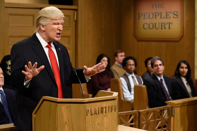 This Saturday, Feb. 11, 2017, image released by NBC shows host Alec Baldwin as President Donald Trump during the “Trump People’s Court” in New York. In his spoof, President Trump made good on a tweeted vow to “see you in court” directed at the three Ninth Circuit federal judges who refused to lift a stay preventing his immigration ban from being enforced. His chosen venue: “The People’s Court,” where he was suing the three judges. (Will Heath/NBC via AP)