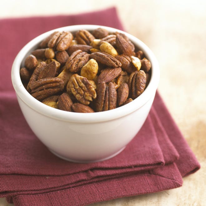 Magnesium breaks down glucose into energy, so being even slightly low in this mineral can cause a dip in energy. Nuts and seeds, both rich in the mineral, can provide a quick boost. [TRIBUNE NEWS SERVICE FILE]