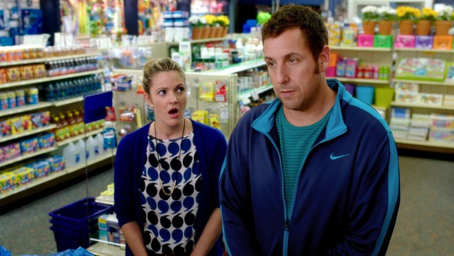 This image released by Warner Bros. Pictures shows Drew Barrymore, left, and Adam Sandler in a scene from the film, "Blended." (AP Photo/Warner Bros. Pictures)