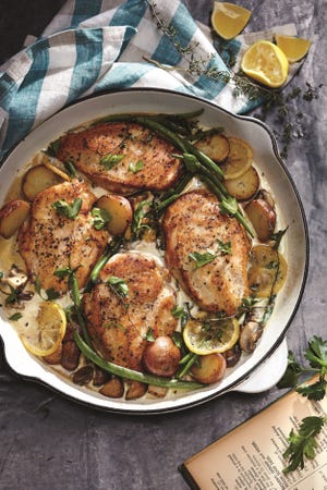 The recipe for weeknight lemon chicken skillet dinner is included in the new book "Cooking That Counts." It shares ideas for meal planning and weight loss. [Photo courtesy of Oxmoor House]