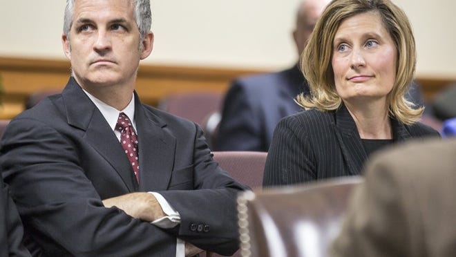 Laura Pressley, right, shown with her husband, Leif Allred, looks on during a 2015 hearing on Pressley’s voluminous discovery requests in her contest of the election she lost to City Council Member Greg Casar.