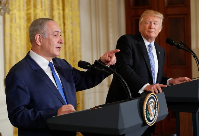 President Donald Trump listens as Israeli Prime Minister Benjamin Netanyahu speaks during their joint news conference in the East Room of the White House in Washington, Wednesday, Feb. 15, 2017. (AP Photo/Pablo Martinez Monsivais)