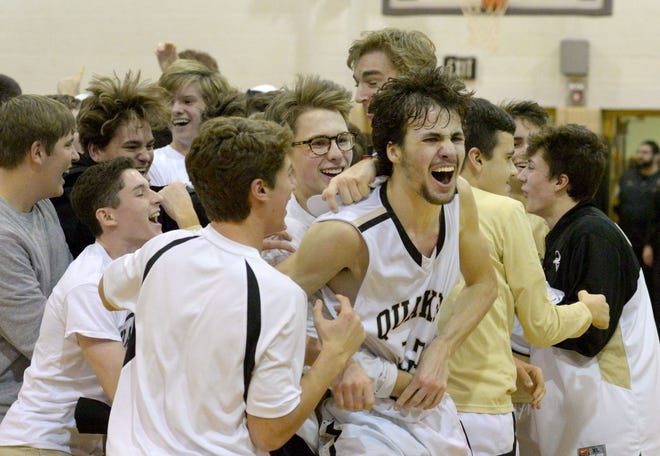 Quaker Valley's Danny Conlan celebrates with his team and fans after beating the New Castle earlier this season.