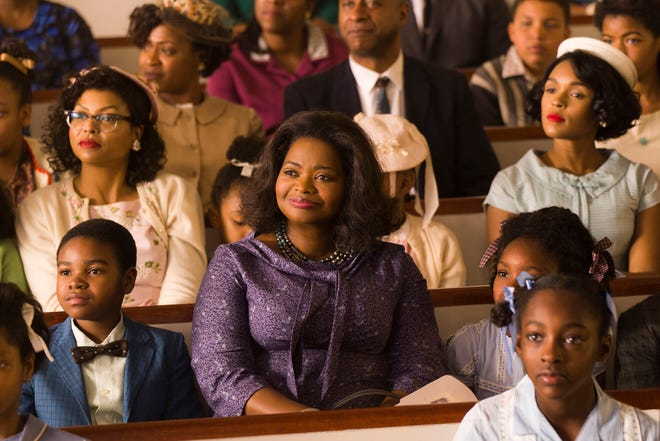 Octavia Spencer, center, and Janelle Monae, background right, in a scene from "Hidden Figures." [Photo by Hopper Stone, Twentieth Century Fox/AP]