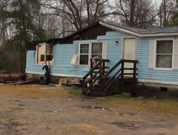 This doublewide mobile home at 1150 Temples Point Road in Harlowe received heavy damage in a blaze Tuesday night.