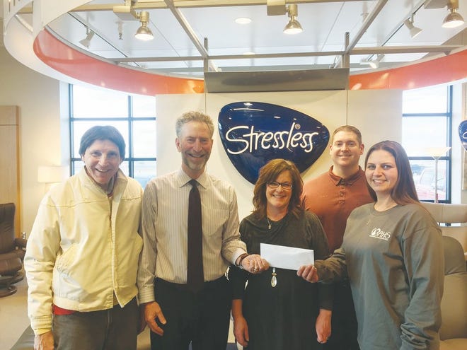 Redeker’s recently donated $500 to the Boone Area Humane Society as the result of a recent store charity promotional event involving Ekornes Stressless chairs. From the left are BAHS Board member Kio Dettman, Redeker’s salespeople John Krengel, Katherine Latham and Wayne Conley and BAHS shelter director Vanessa McCutcheon.