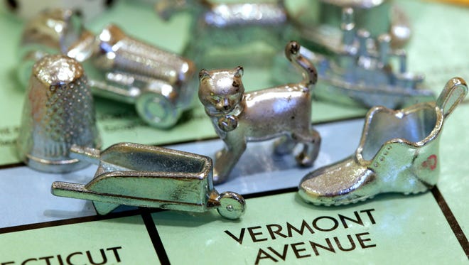 The thimble will no longer be a game piece in Monopoly, rejected in 2017 in a campaign to determine the tokens for the next generation of the game. (Associated Press, file)