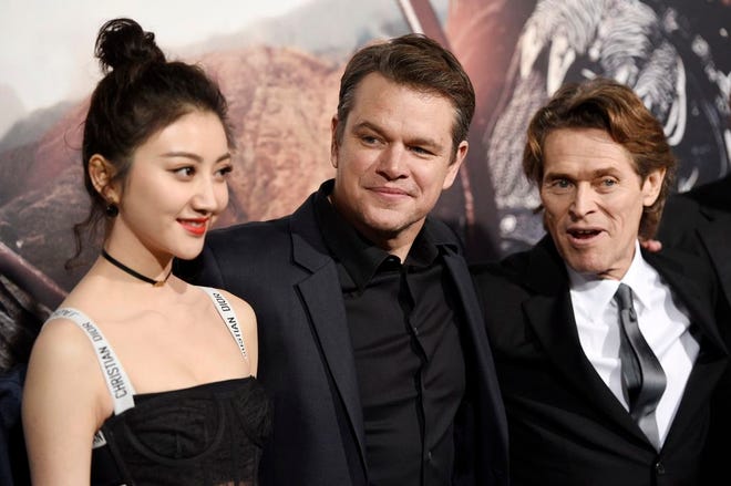 From left, Jing Tian, Matt Damon, and Willem Dafoe, cast members in "The Great Wall," pose together at the premiere of the film at the TCL Chinese Theatre on Wednesday in Los Angeles. (Photo by Chris Pizzello/Invision/AP)