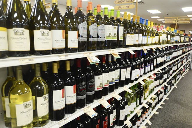 Wines line the shelves at Fine Wine & Good Spirits store in Sewickley.