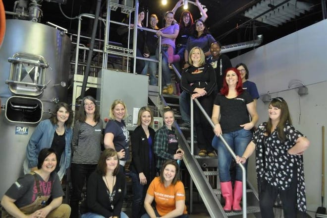 Members of the North Carolina chapter of the Pink Boots Society are shown during a brew day at Mystery Brewing in Hillsborough. The group will host the Biere de Femme festival March 11 in Shelby. [Courtesy of Pink Boots Society]