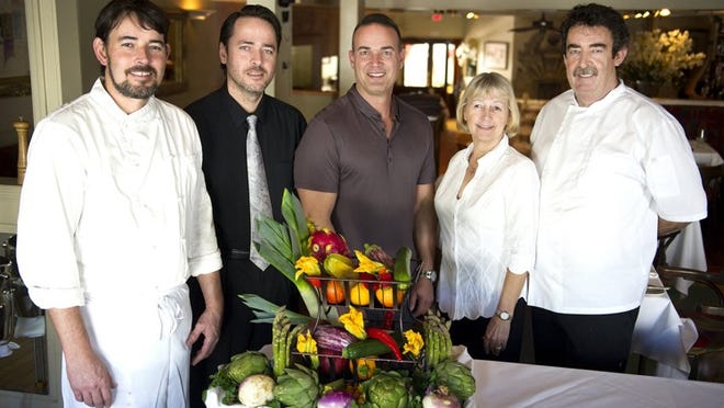 Guillaume and David Leverrier, Jack Scalisi, Nicole and Jean-Pierre Leverrier with fresh produce at Chez Jean-Pierre. (Meghan McCarthy / Daily News)