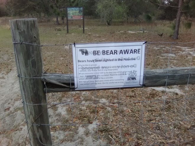 A sign warns that bears have been sighted on the Preserve. [RICK REED / CORRESPONDENT]