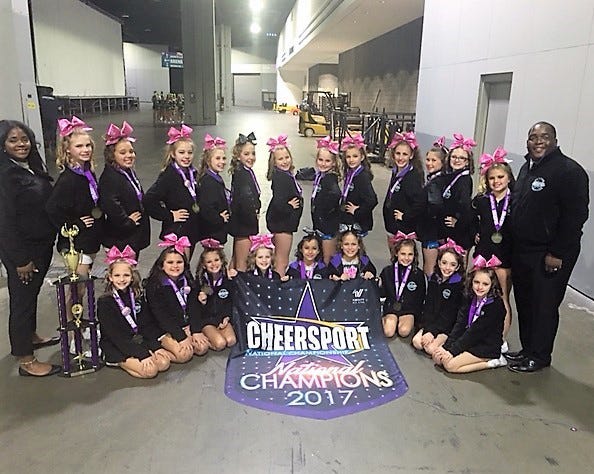 The Angel Sharks (ages 9-11) won a national title in the CHEERSPORT competition last weekend in Atlanta.They represent Savannah Sharks Cheerleading and Tumbling. (Photo courtesy of the Angel Sharks)