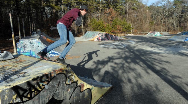 Dylan Meier, 19, of Sandwich, tries out his skateboard at the Falmouth Skate Park Tuesday afternoon. A new, 10,000-square-foot park could be under construction as soon as this summer. [Ron Schloerb/Cape Cod Times]