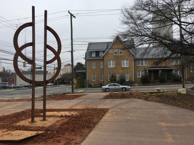 The sculpture "Discursus" as it appeared after being installed in January at Heritage Park, at the corner of Marietta Street and Second Avenue. [Michael Barrett/The Gazette]