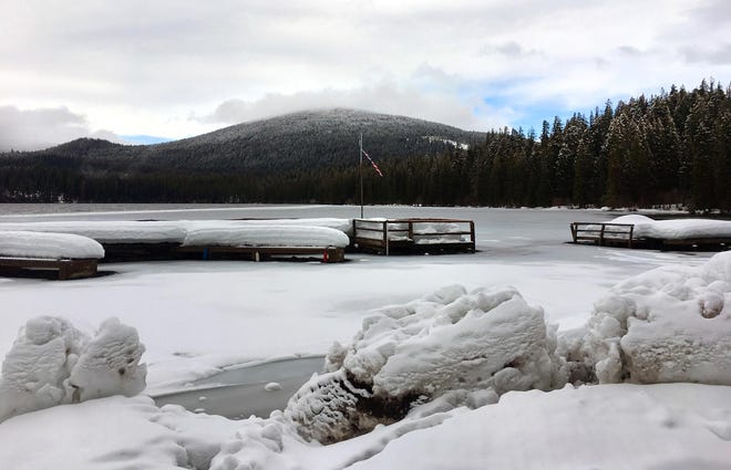 Snow and ice cover the eastern edge of Odell Lake near Odell Lake Lodge & Resort on Saturday, Feb. 18, 2017. Up to a foot of snow could fall in the Willamette Pass area this week. (Rob Romig/The Register-Guard)