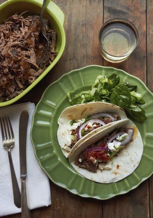 Barbacoa beef tacos are from a recipe by Katie Workman. (Mia via AP)
