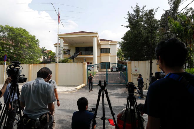Journalists wait outside the North Korean Embassy in Kuala Lumpur, Malaysia, Thursday, Feb. 23, 2017. North Korea denied Thursday that its agents masterminded the assassination of the half brother of leader Kim Jong Un, saying a Malaysian investigation into the death of one of its nationals is full of “holes and contradictions.” (AP Photo/Vincent Thian)