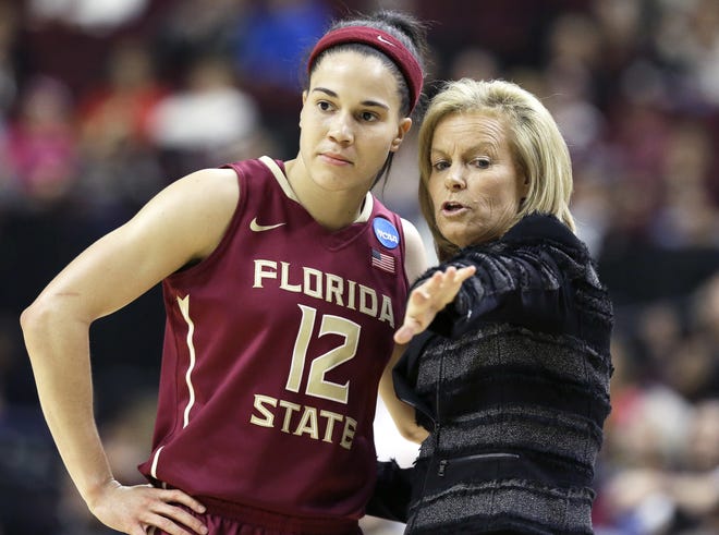 Florida State coach Sue Semrau talks with Brittany Brown (12) during the second half of a game against Texas A&M on March 21, 2016, in College Station, Texas. Florida State's seniors have the most wins as a class in school history but this is their last chance to get the No. 8 Seminoles to the Women's Final Four for the first time in school history. [AP Photo / Pat Sullivan, File]