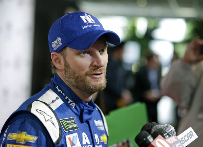Dale Earnhardt Jr. answers questions during an interview at NASCAR Daytona 500 media day at Daytona International Speedway on Wednesday. [AP Photo / John Raoux]