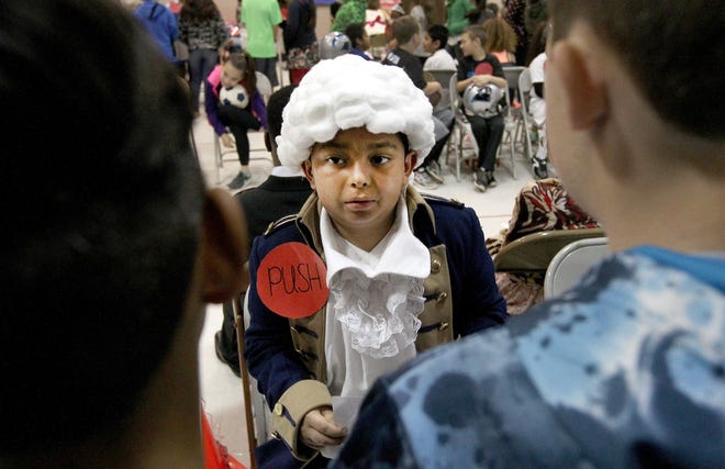 Edgardo Samabria portrays President George Washington during North Belmont Elementary's Annual Third Grade Wax Museum Wednesday morning. [JOHN CLARK/THE GAZETTE]
