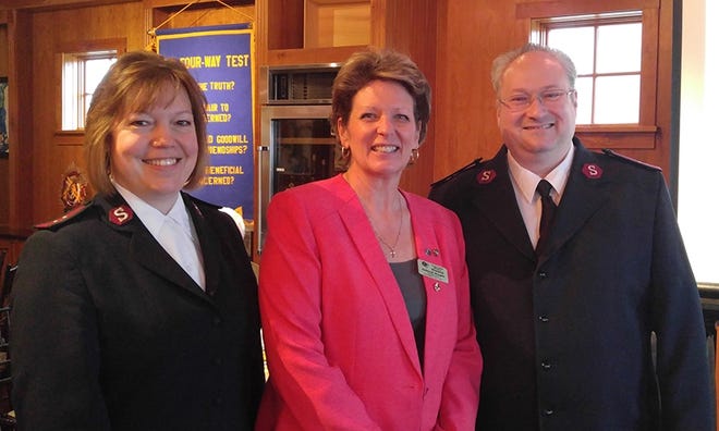 Canandaigua Salvation Army commanders Tricia Brennan, left, and Jim Brennan, right, were presented with $585 from Canandaigua National Bank, raised during a Jean Day. At center is Deborah E. Rought, vice president at CNB. [PHOTO PROVIDED]