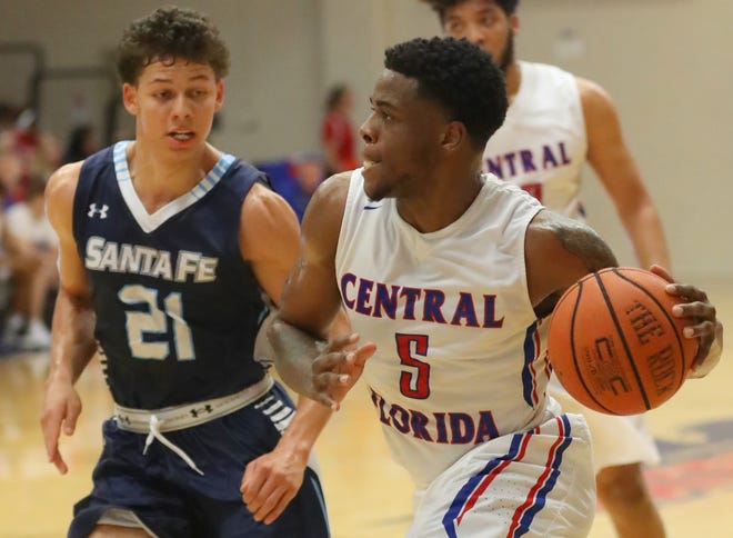 Malik Dunbar led the offensive charge for the Patriots with 20 points and six rebounds in the Patriots' loss to Santa Fe in Gainesville on Wednesday night. [Star-Banner Photo/Bruce Ackerman/FILE]