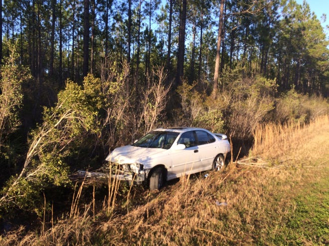 One man was hospitalized after a single-car wreck Thursday afternoon near the entrance to Northwest Florida Beaches International Airport. [ZACK McDONALD/THE NEWS HERALD]