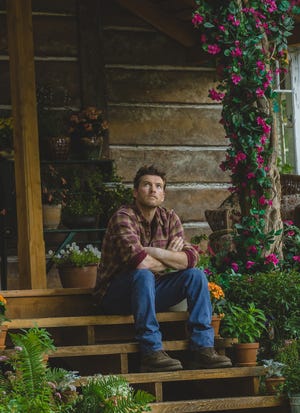 Mack (Sam Worthington) takes some time to ponder life and death in “The Shack.” (Photo by Jake Giles Netter)