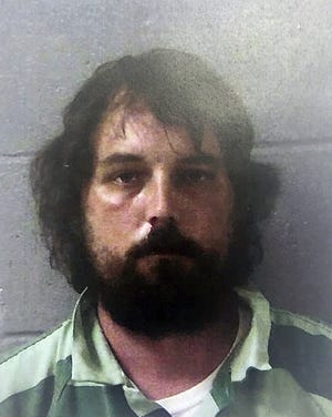 This Feb 22, 2017 photo released by the Georgia Bureau of Investigation shows Ryan Alexander Duke, in Georgia. Duke was arrested by authorities on murder charges in the disappearance of a high school teacher in rural south Georgia more than 11 years ago. (Georgia Bureau of Investigation via AP)