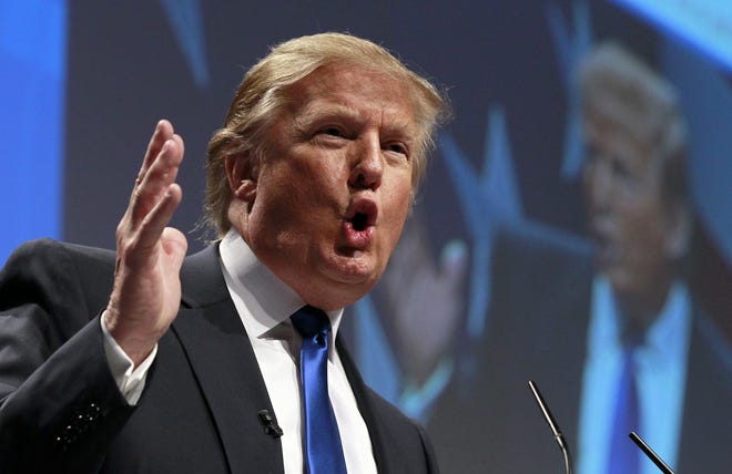 FILE - In this Feb. 10, 2011, file photo, Donald Trump addresses the Conservative Political Action Conference (CPAC) in Washington. In 2011, as the þÄúmoney, money, money, moneyþÄù chorus of his reality TV showþÄôs theme song blasted, Trump stepped out before the nationþÄôs largest gathering of conservative activists for the first time. The crowd was less than adoring, occasionally laughing at and booing the longtime former Democrat. (AP Photo/Alex Brandon, File)