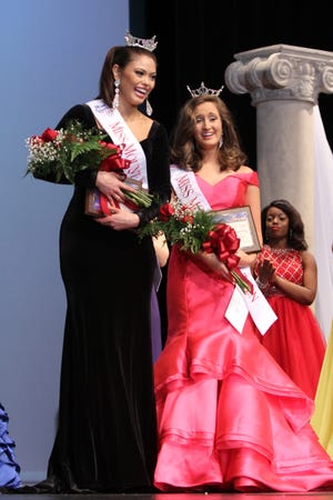 The new Miss Mount Holly Allison Farris (left) and Miss Mount Holly's Outstanding Teen Chloe Clary (right) walk the stage at Stuart W. Cramer High School after being crowned at the conclusion of the 2017 Miss Mount Holly Scholarship Pageant on March 19. [LENN LONG/PAGEANTPICS.COM]