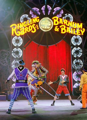 Clowns entertain at the Ringling Bros. and Barnum & Bailey Circus show. Associated Press photos.