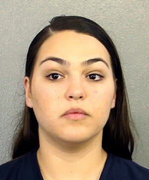 Ana Lucia Gnecco, a U.S. Navy sailor, is accused of deserting her post after having a baby in August. [Broward County Sheriff's Office via AP]