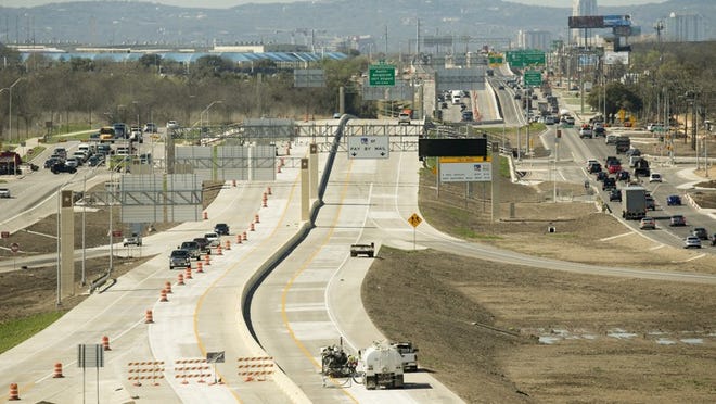 Texas 71’s new toll lanes, seen from atop a flyover to Texas 130, will cost 87 cents for a three-mile ride.