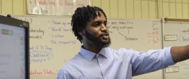 Maureik Robison, a fourth-grade teacher at Emma E. Booker Elementary School in Sarasota, in an image from his music video, "Let's Write It." [PROVIDED BY SARASOTA COUNTY SCHOOLS]