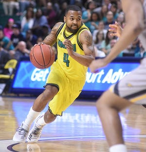 UNCW men's basketball will head to the CAA Tournament in Charleston, S.C., this week. [Ken Blevins/StarNews Photo]