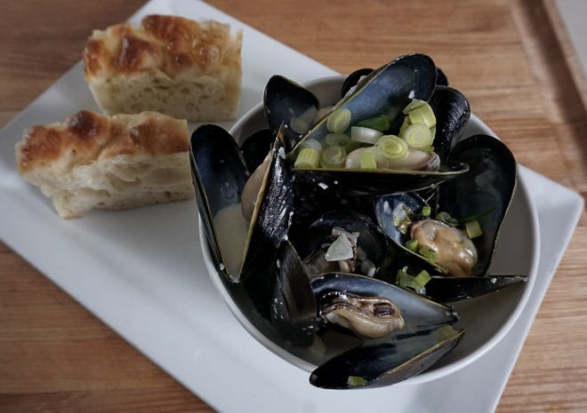 Steamed Mussels with Shallots and Creme Fraiche makes a terrific first course or light entree, served with focaccia or crusty bread to soak up the flavorful broth. The Providence Journal/Sandor Bodo