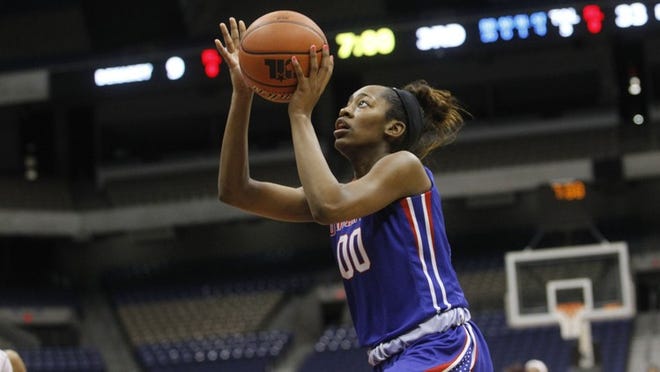 Duncanville’s Zarielle Green drives to the basket during her team’s lopsided victory over Spring Dekaney for the Class 6A state championship last season. Green scored 25 points in the 2016 final at the UIL girls basketball state tournament. CREDIT: Stephen Spillman/For American-Statesman