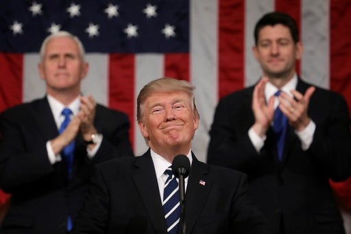 President Donald Trump addresses a joint session of Congress on Capitol Hill in Washington, Tuesday, Feb. 28, 2017, as Vice President Mike Pence and House Speaker Paul Ryan of Wis., applaud.